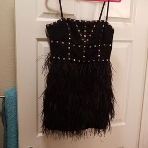 Studs and feather dress